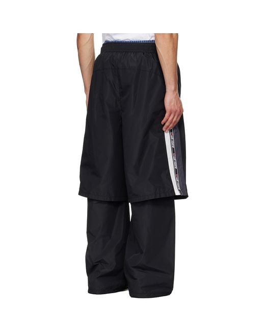 we11done Black Triple Layered Track Pants for men