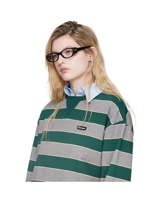 Miu Miu Brown Oval Glasses