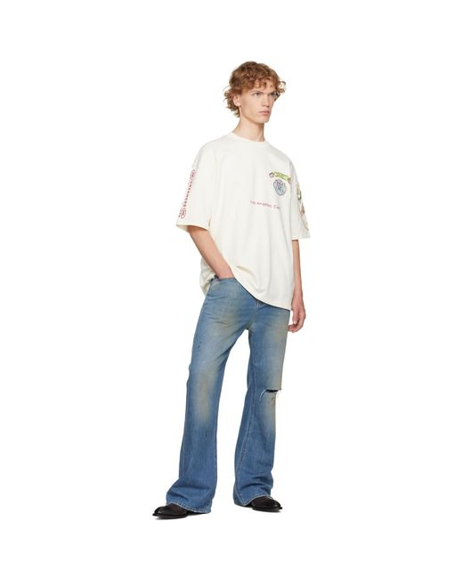 Amiri Blue Slash Bootcut Jeans for men