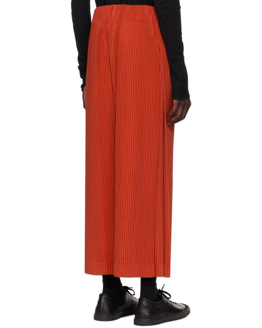 Homme Plissé Issey Miyake Red Homme Plissé Issey Miyake Orange Pleats Bottoms 2 Trousers for men