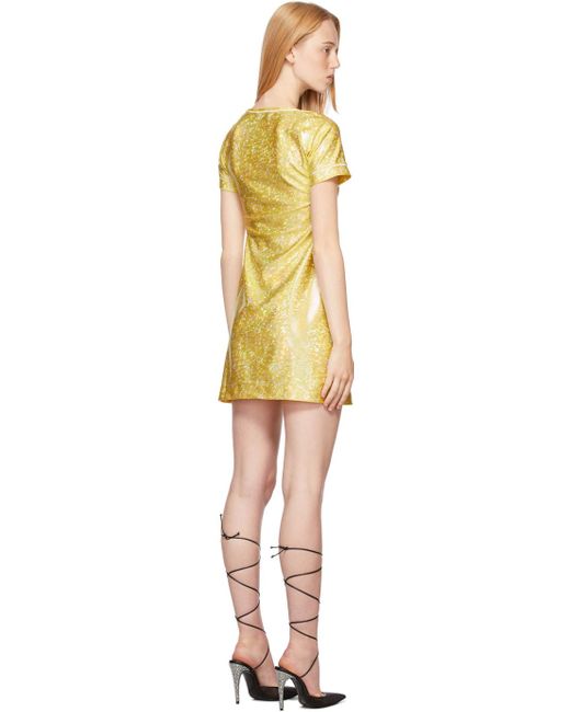 saks gold dress