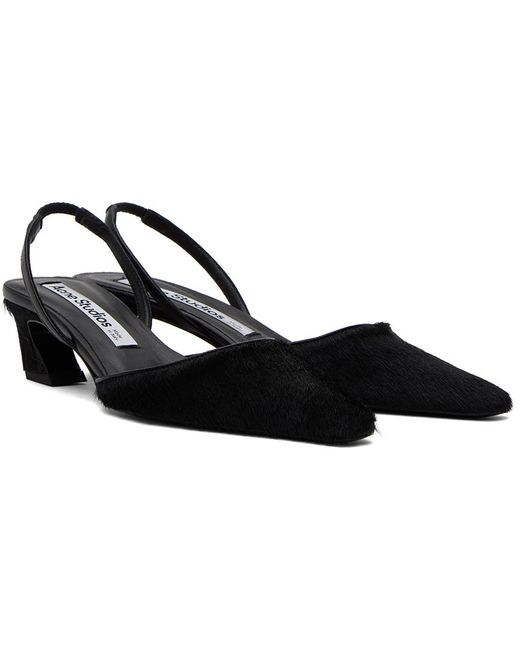 Chaussures à petit talon noires à bride arrière Acne en coloris Black