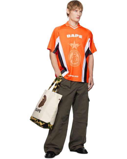 A Bathing Ape Orange Multi Logo Soccer Jersey T-Shirt for men