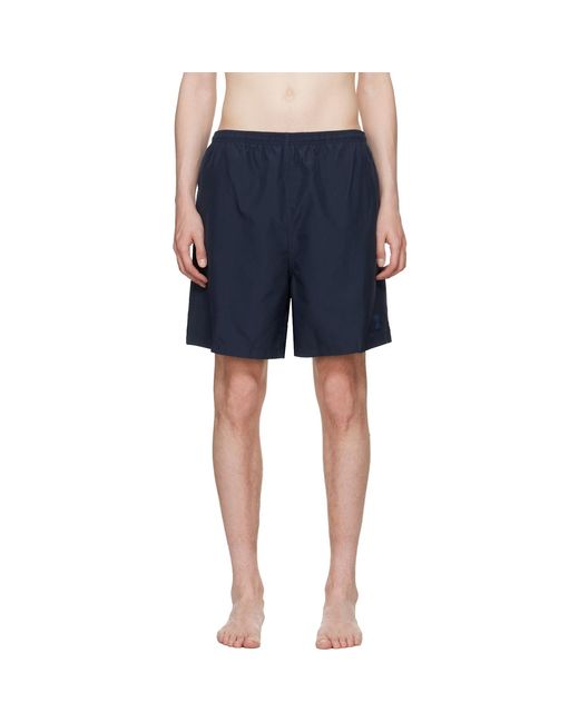 AMI Blue Long Plain Swim Shorts for men