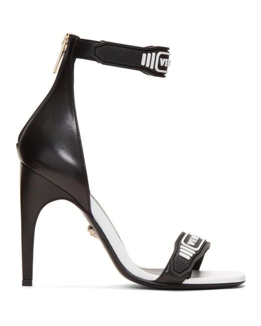 VERSACE Pin-Point buckled leather sandals | NET-A-PORTER