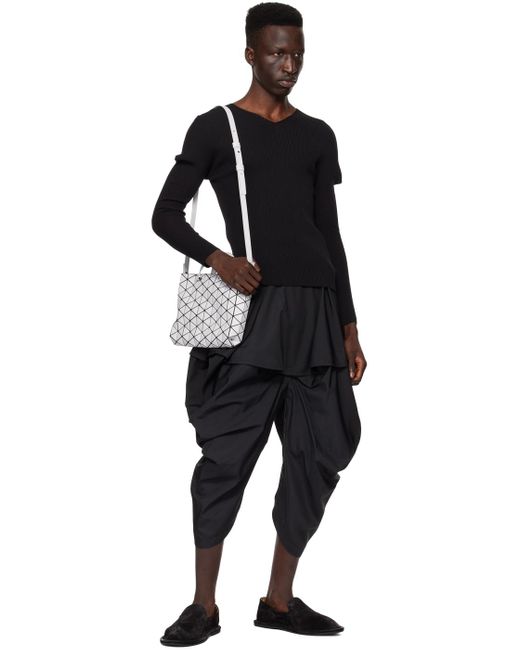 132 5. Issey Miyake Black Bubble Solid Trousers for men