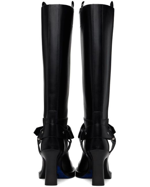 Bottes hauteur genou noires en cuir à bride de style sous-pied Burberry en coloris Black
