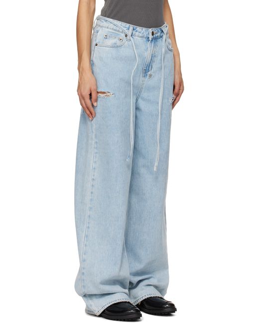 Jean Ample Rollin Bleu À Découpes Ksubi en coloris Blue