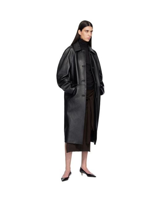 Totême Black Raglan Leather Coat