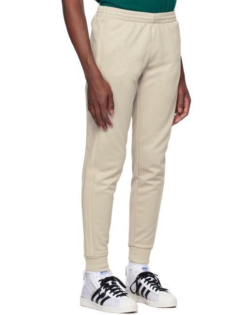 Adidas Originals Natural Monogram Track Pants for men
