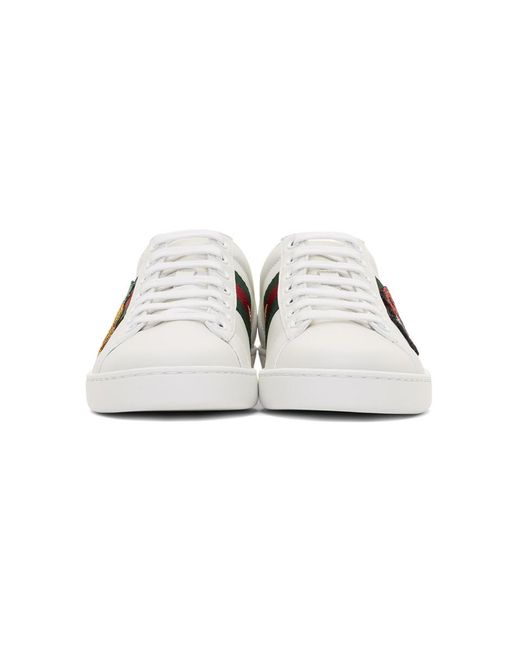 Gucci store ladybird trainers