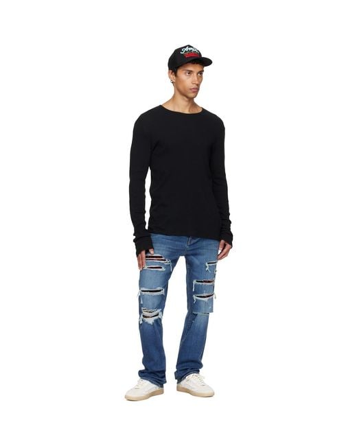 Amiri Blue Floral Velvet Slim Thrasher Jeans for men