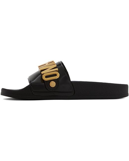 Sandales à enfiler noires en pvc à ferrure à logo Moschino en coloris Black