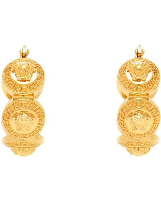 Boucles d'oreilles à anneau tribute dorées à méduses Versace en coloris Black