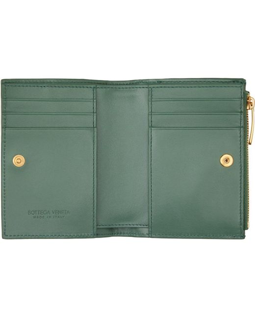 Petit portefeuille vert tissé façon intrecciato à deux volets Bottega Veneta en coloris Green