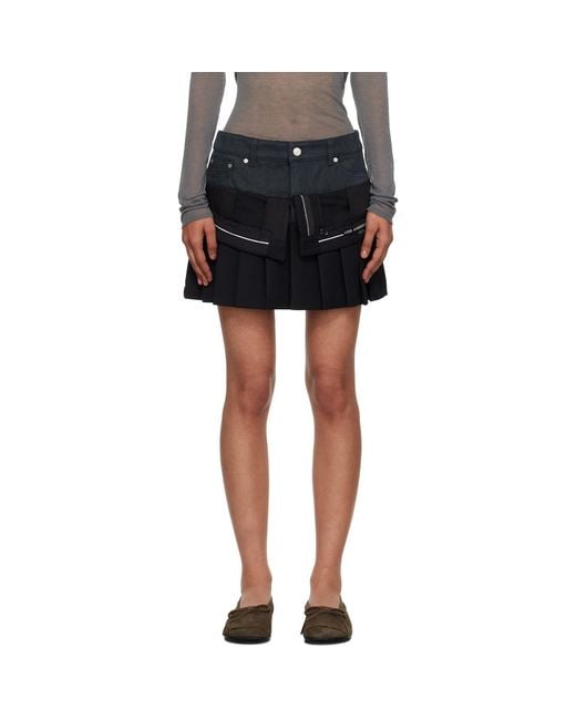 ANDERSSON BELL Black Inside Out Pleats Miniskirt