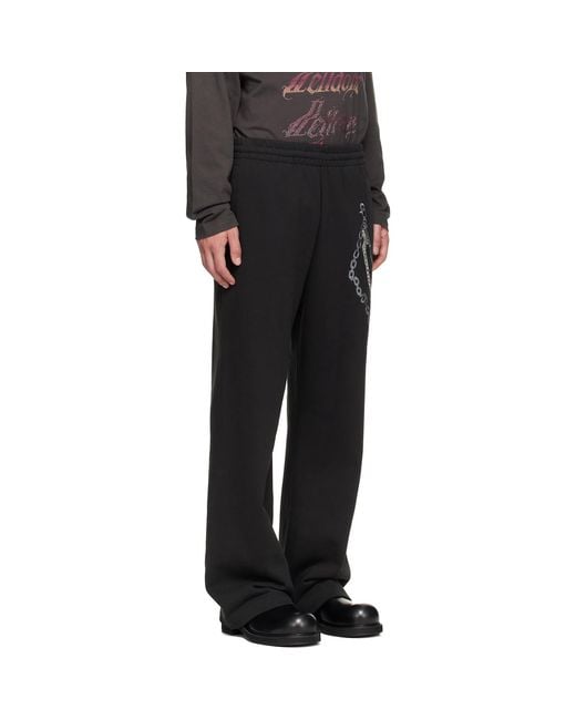 we11done Black Chain Embroidered Sweatpants for men