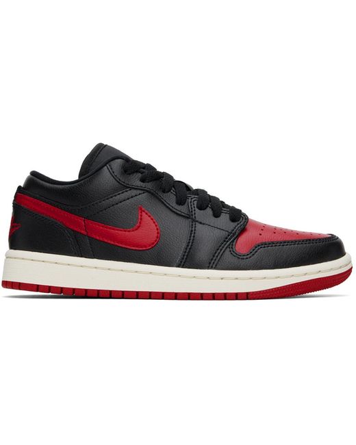 Baskets basses air jordan 1 noir et rouge Nike en coloris Black