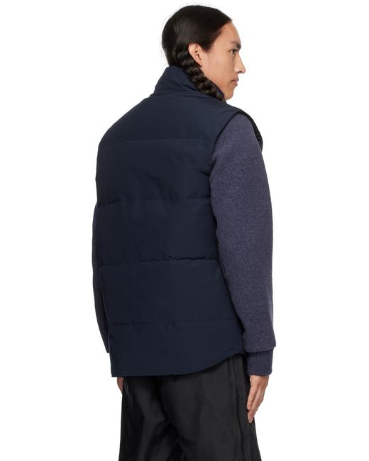 Veste freestyle bleu marine rembourrée en duvet Canada Goose pour homme en coloris Blue