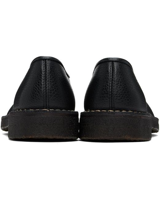 Chaussures à enfiler noires à passepoils Lemaire en coloris Black