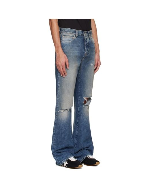 Amiri Blue Slashed Bootcut Jeans for men