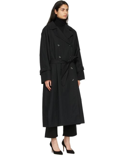 Totême Techno Trench Coat in Black 