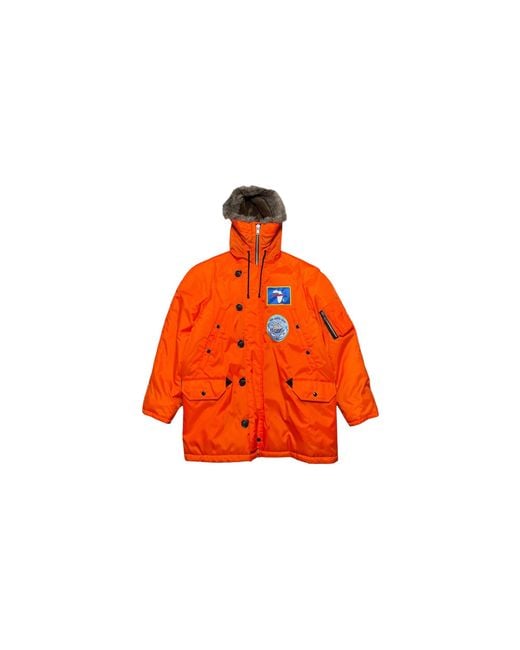 DENIM TEARS Orange Longest Trip Patch Parka Jacket Dt610" for men