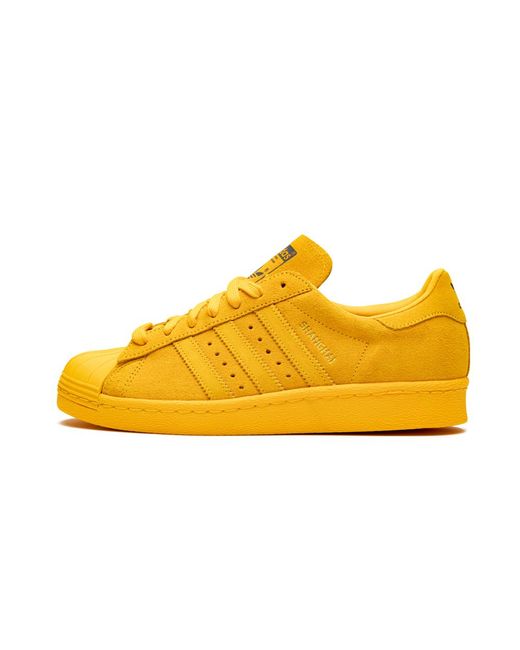 yellow adidas superstar shoes
