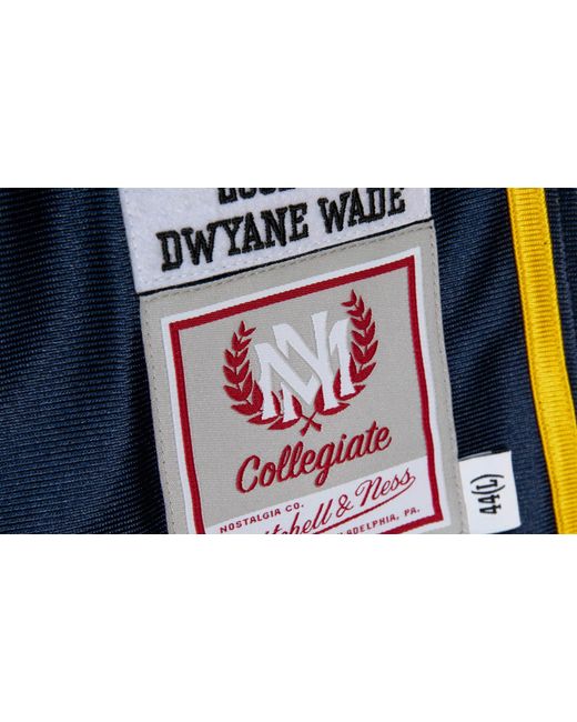 Mitchell & Ness Black Ncaa Road Jersey "Marquette 2002 Dwyane Wade" Ajy54218 Mau02Dwaasbl" for men