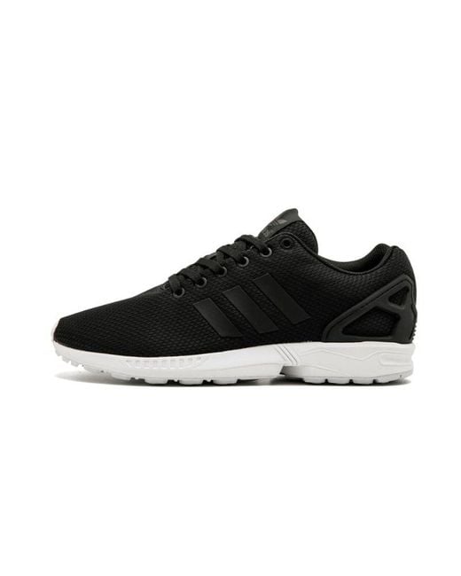 Adidas black and gold flux zx sale