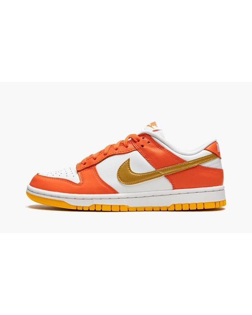 womens dunk low golden orange