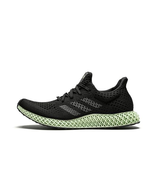 adidas black and green shoes