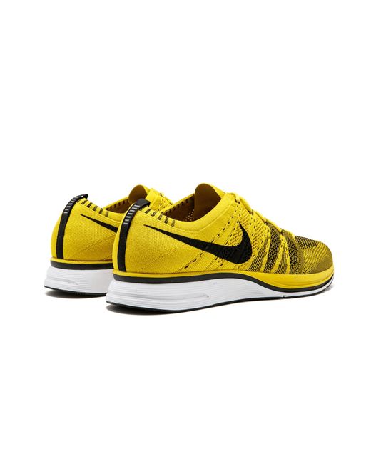 red and yellow trainers