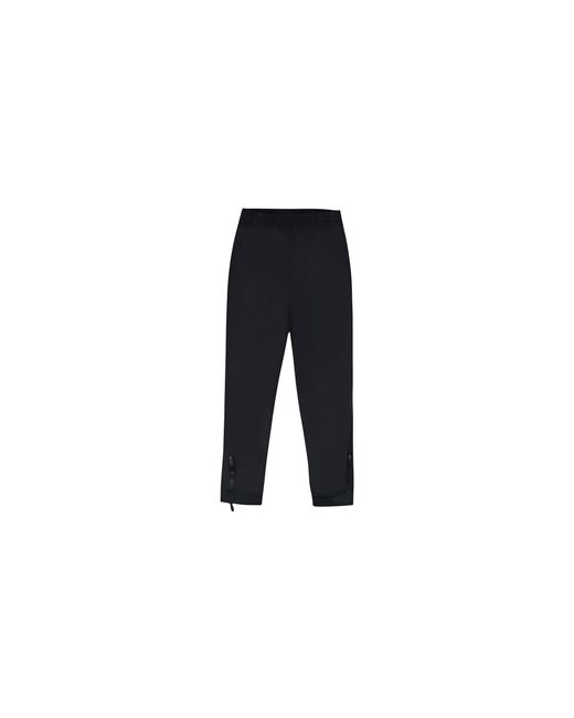 Rhude Black Reversed Nylon Track Pants Rhd Mbtm 0278 Blac" for men