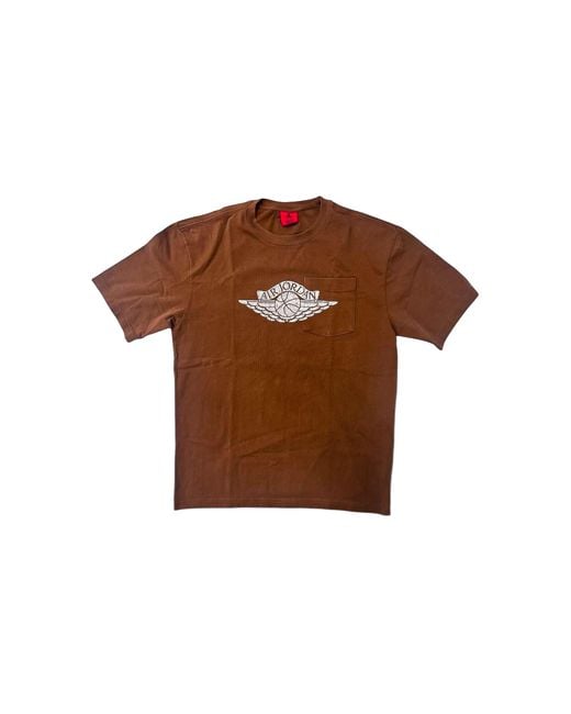 Nike Brown Flight Essentials Pocket T-Shirt "Light British Tan/Shadow" Io2084 281" for men