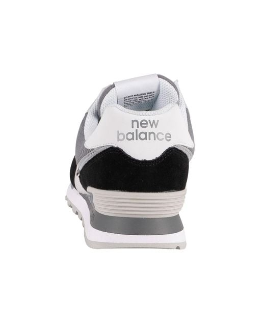 new balance black suede 574 trainers