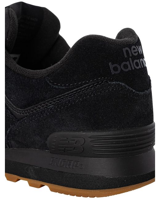 New balance black 2025 suede 574 trainers