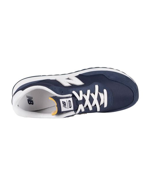 new balance blue suede sneakers