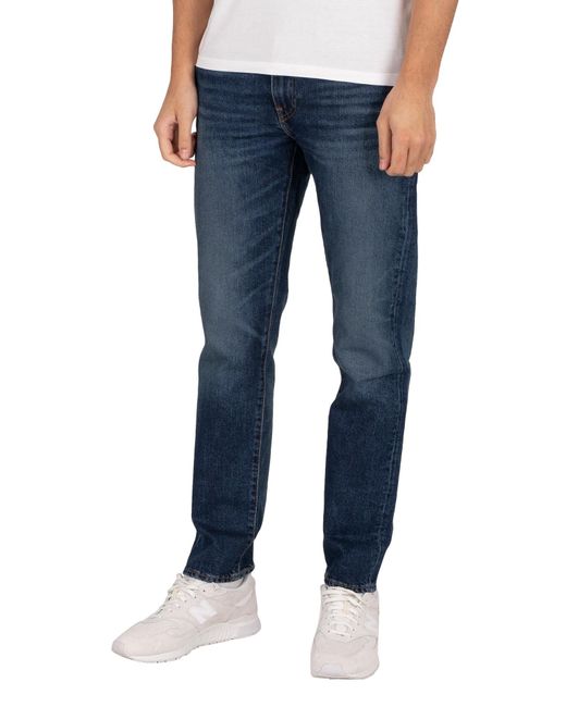 502 taper jeans