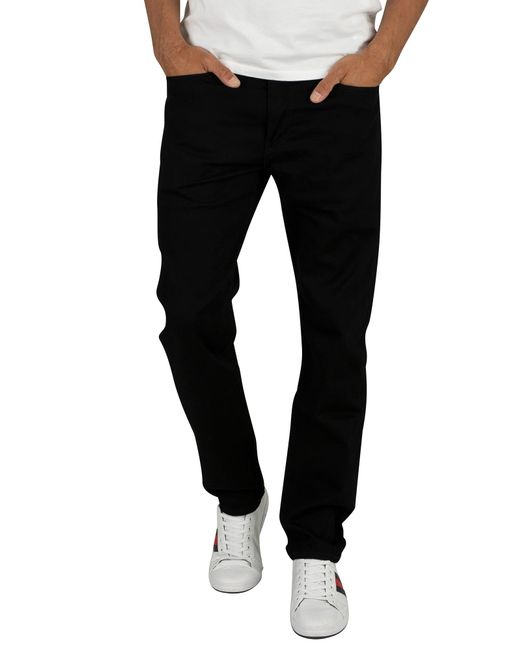 502 regular taper jeans