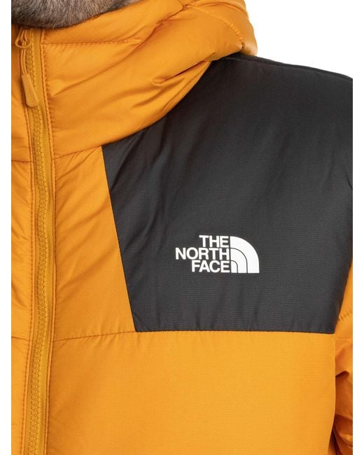 The North Face Orange Massif Puffer Jacket for men