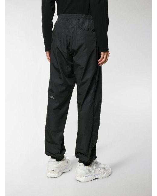 a cold wall track pants