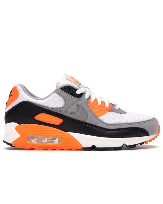 nike black and orange sneakers