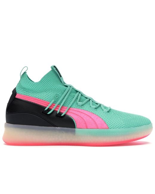 black pink and green pumas