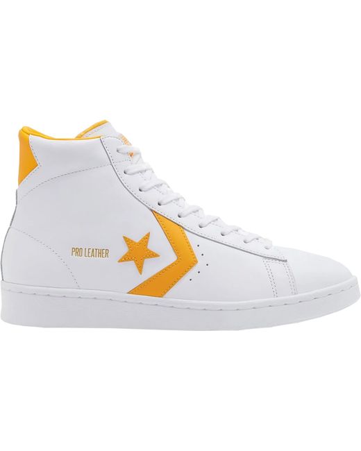 yellow and white converse