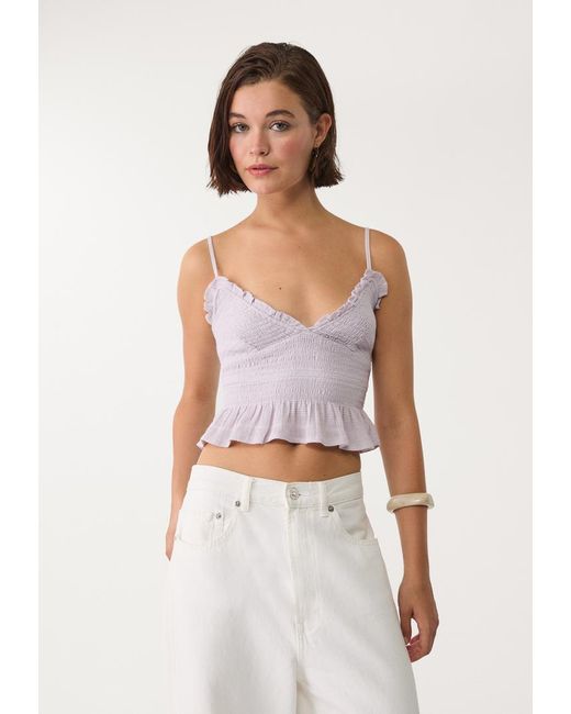 Top Aderente Con Volant di Stradivarius in White