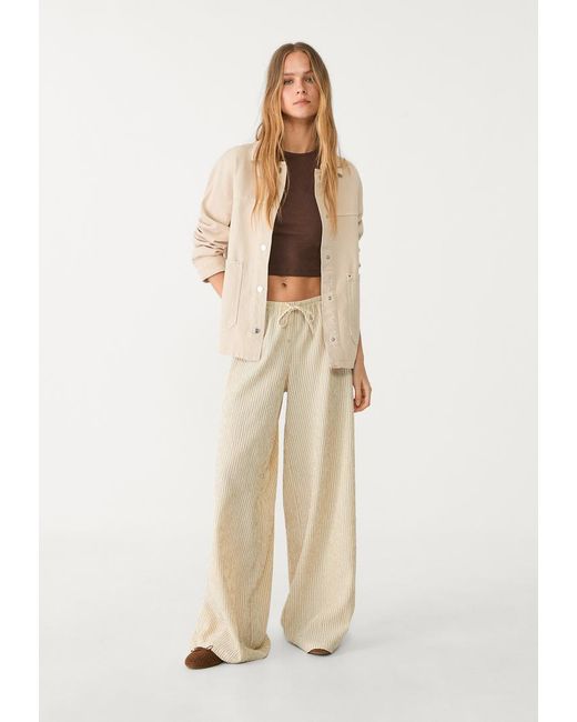 Pantaloni Fluidi Lunghi A Righe di Stradivarius in Natural
