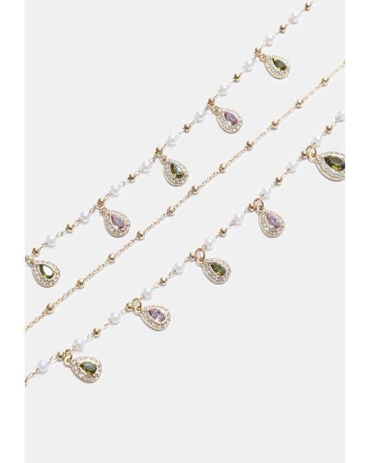 Collana Lunga Multicharm di Stradivarius in Metallic