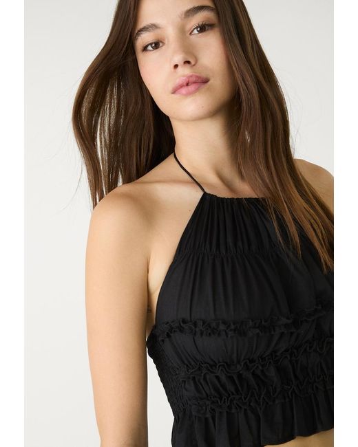 Top Halter Con Schiena Scoperta di Stradivarius in Black