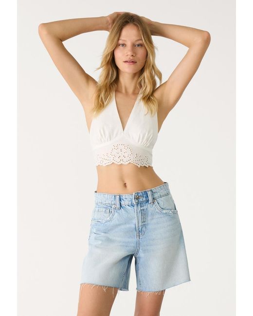 D93 Short Denim Longline Stelle di Stradivarius in Blue